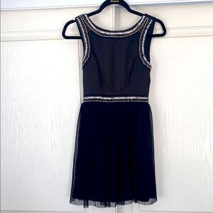 Love Reign- Elegant Black Sleeveless Dress with Silver Accents